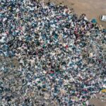 colun-ortasinda-39-bin-ton-kiyafet-bulundu-sebebini-duyan-isyan-ediyor-ziNWjUxC